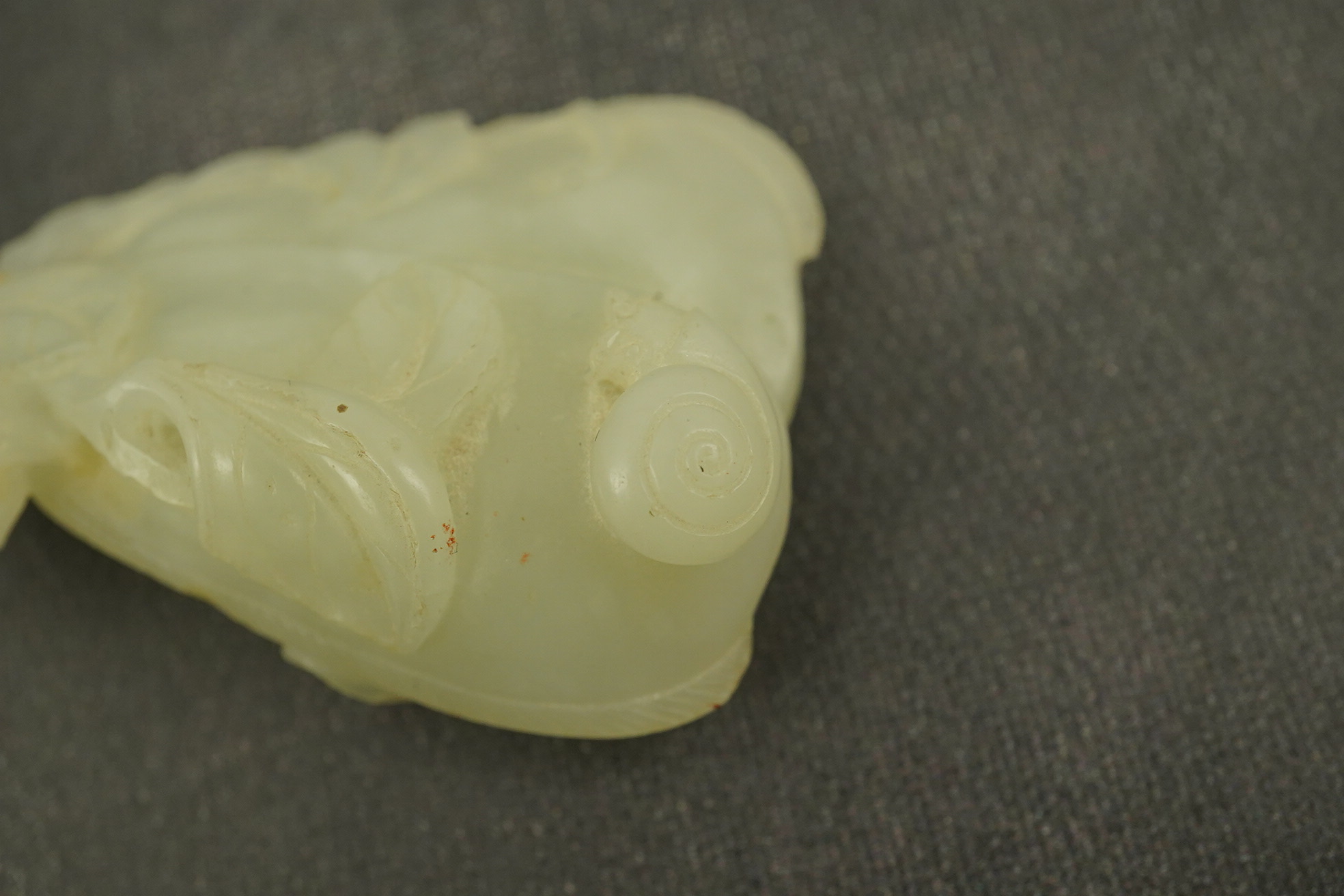 A Chinese pale celadon jade twin gourd pendant, 18th century